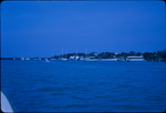 View from the ocean of boats anchored in the harbor of Man of War Cay, Abaco, Bahamas