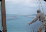 A young man during a fishing trip in Andros, Bahama