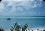 View of a boat anchored in the sea off the coast of the Exumas, Bahamas
