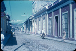 Busy cobblestone street in Trinidad