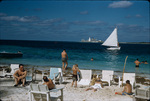 Tourists on a beach in New Providence, Bahamas