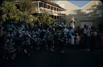 Jonkonnu festival paraders pass a crowd on Bay Street, New Providence, Bahamas