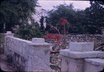 A stone and concrete wall around an abandoned lot, New Providence, Bahamas