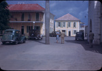 People and automobiles on a street in Nassau, New Providence, Bahamas