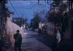 People walking down a street in New Providence, Bahamas
