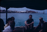 Tourists on a boat sailing away from Nassau Harbor, New Providence, Bahamas