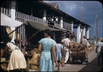 People buying produce at the wharf market near Nassau Harbor, New Providence, Bahamas