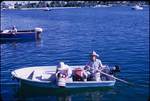 A man and a woman in a boat in sea near Elbow Cay