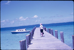A woman waiting on the dock on Green Turtle Cay