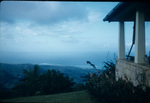View of a home and the sea from the mountains of Saint Ann, Jamaica