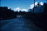 Women, children, and a boy standing on the road bridge near Moore Town, Portland, Jamaica
