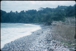 A pebble shoreline with fishing nets near eastern Ocho Rios, Saint Ann, Jamaica