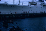 Passengers disembark from Steamship Regina anchored near Kingstown, Saint George, Saint Vincent