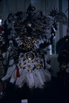 Gold and white feathered carnival costume on exhibit in the National Museum and Art Gallery of Trinidad and Tobago