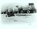 Photograph of Orange Packers Loading Trucks with Crates of Oranges