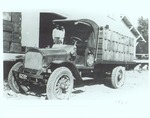 Photograph of a Truck Loaded with Crates of Oranges