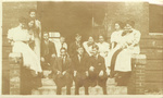 Black-and-white photograph of Clara Louise Guild with Sanford High School Students and Faculty
