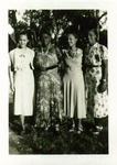Mary McLeod Bethune with three students