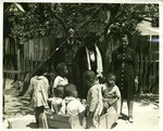 Mary McLeod Bethune converses with small children