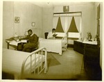 Male students study in their dorm