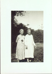 Alice Ellen and Clara Louise Guild in a garden