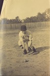 Stetson University - Baseball player fields a ball
