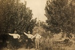 Three men on site of future Slavia Colony, 1911