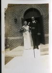 Bridal party exits first wedding in brick church, July 9, 1939