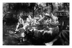 Church Picnic, c. 1940. Ladies enjoy the shade with their little ones.