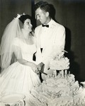 Wedding, June 14, 1959. Cutting of the cake on the stage of St. Luke's School Auditorium