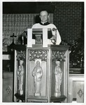 Rev. Stephen M. Tuhy in pulpit. 1959 and 1962