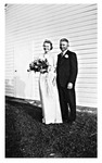 Elizabeth Mikler and Andy Duda, Jr. on the wedding day of Ferdinand and Anna Duda. June 12,1938, Black and White