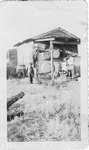 Michael Mikler near his shed and washhouse. 1920s, Original