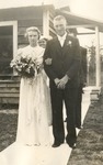 Elizabeth Mikler and escort exit wood church after Tesinsky wedding, August 21,1938., Original