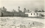 Office of A. Duda and Sons,Inc. with boxcars heading to the packing house. 1930s, Original