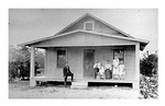 Family of  Michael Mikler, st, on the porch of their home, c.1924, Black and White