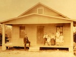 Family of  Michael Mikler, st, on the porch of their home, c.1924, Enhanced