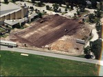 Three views of site preparation for new school. 2000