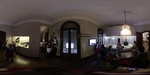 360 view of visitors exploring the Evitas House Art Museum in Buenos Aires, Argentina with displays of historical artifacts by Wendy Howard