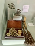 Carved Silver Candlesticks with Military Design (Top); Game of Checkers with Ivory and Painted Tokens (Bottom). Enrique Udaondo Museum, Luján, Buenos Aires by Wendy Howard