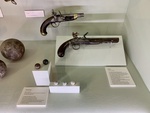 Pistol from France, Spark Type (Top); Pistol, Spark Type (Middle); Iron and Lead Projectiles. Enrique Udaondo Museum, Luján, Buenos Aires