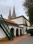View of the Spires of Luján Basicila from Grounds of Museum. Enrique Udaondo Museum, Luján, Buenos Aires by Wendy Howard