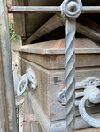 View of Wooden Coffin Through Iron Grille.  Recoleta Cemetery