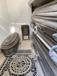 View of Coffins and Grate Inside of a Mausoleum. Recoleta Cemetary