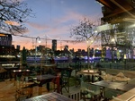 Evening View of Puerto Madero from Restaurant Patio, Buenos Aires by Wendy Howard