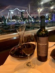 Wine and Glassware at a Restaurant with Evening View of Puerto Madero, Buenos Aires 2 by Wendy Howard