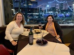 Patrons Enjoying Wine at a Restaurant with Spectacular Evening View of Puerto Madero, Buenos Aires 1 by Wendy Howard