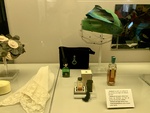 Detail of Hat, Perfume Bottles, and Purse. Artifacts Associated with the Life of Evita Perón. Evita House, Buenos Aires by Wendy Howard