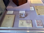 Artifacts Associated with Eva Perón: Book on Rights of Women, Lapel Pins, and Women's Voting Reminder. Evita House, Buenos Aires by Wendy Howard