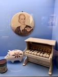 Artifacts Associated with Evita Perón: Toys and Small Painting of Evita. Evita House, Buenos Aires by Wendy Howard